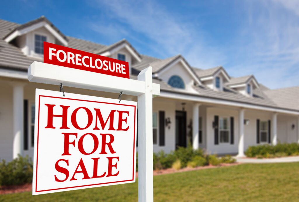 Foreclosure Home For Sale Real Estate Sign and House